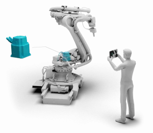3D Ingenieur steht mit Tablet und ARM App vor einem Industrieroboterarm und AR Inhalte sind angezeigt